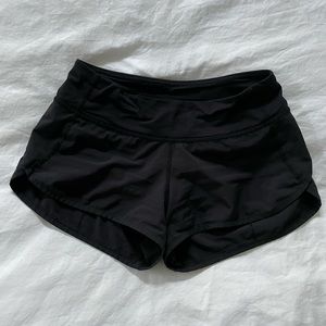 Black lululemon running shorts, size 2.